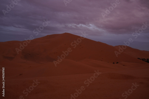 Hiking and camel rifing in the highest dunes of Erg Chebbi, Sahara desert, Morocco