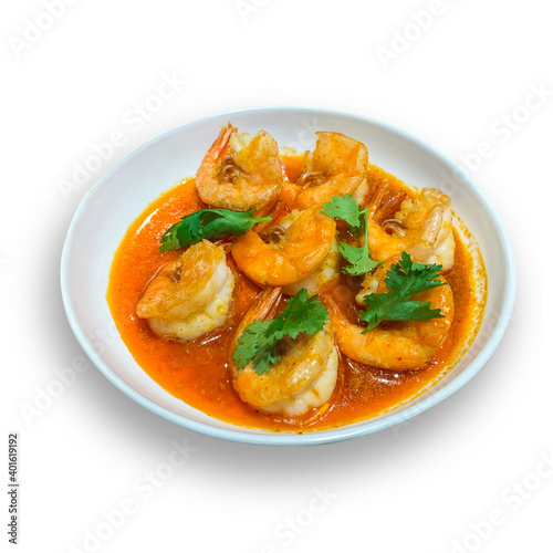 Fried shrimp with salted egg sauce on white background