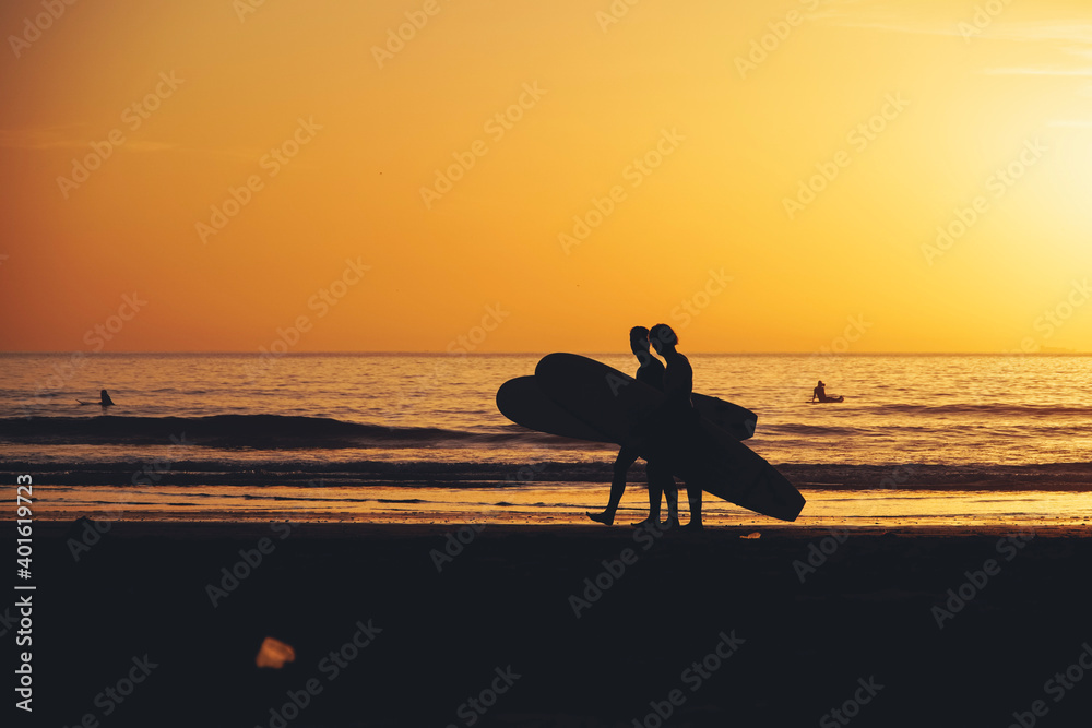 Photography Poster Surfers during sunset in Taghazout, Morocco