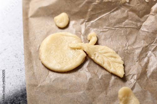 Dough in apple shape on baking parchment