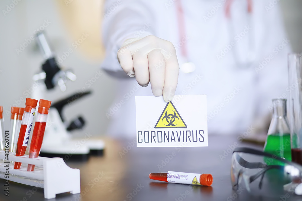 A scientist researcher in the laboratory is testing drugs for the treatment of viral pneumonia. Coronovirus blood test of infected patients. World pandemic. A scientist researcher in the laboratory is testing drugs for the treatment of viral pneumonia. Coronovirus blood test of infected patients. World pandemic.