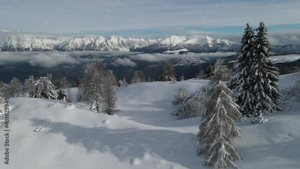 shooting from the drone - snowy mountain landscape - forest and meadows with snow - shooting from the drone - snowy mountain landscape - forest and meadows with snow -