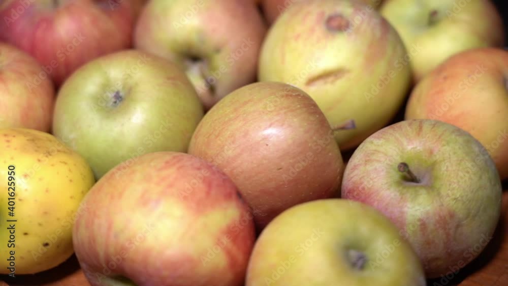 apples in the foreground as they swirl around