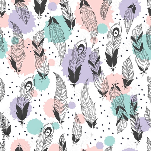 Vector seamless feathers pattern in boho style 