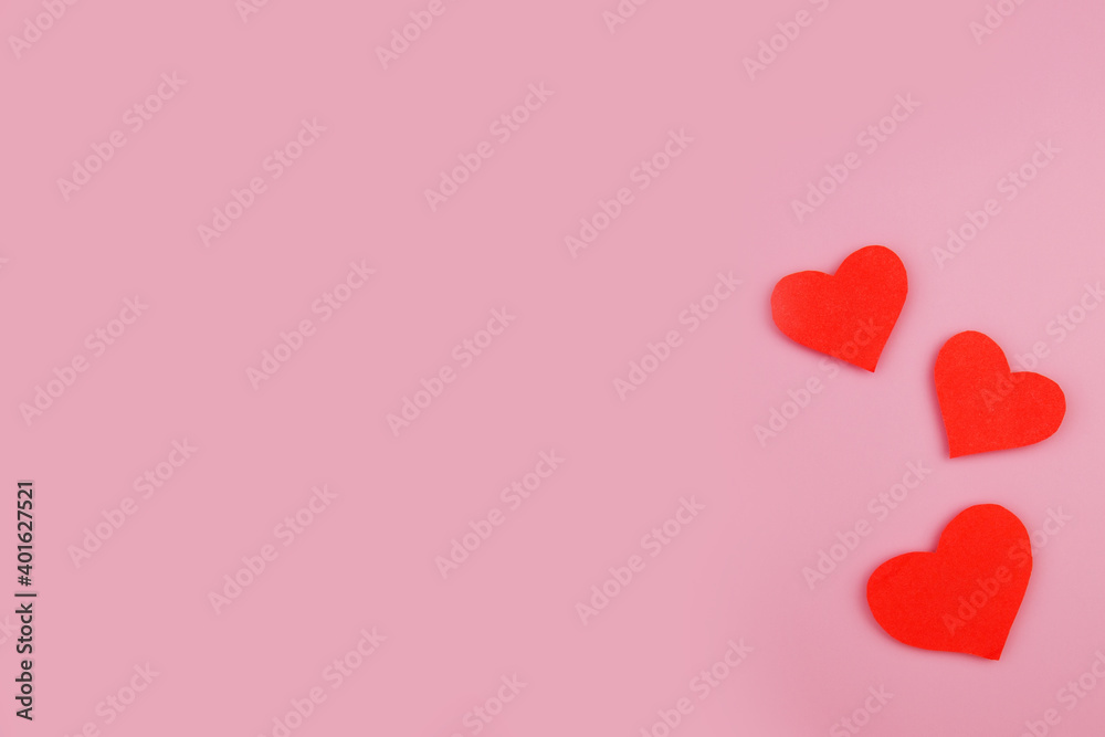 Pink background with paper cut hearts and copyspace. Valentine's Day, Mother's Day or Women's Day