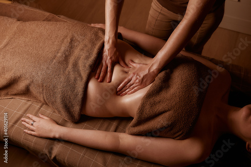 close up of a person receiving a massage. Belly massage. Cellulite treatment
