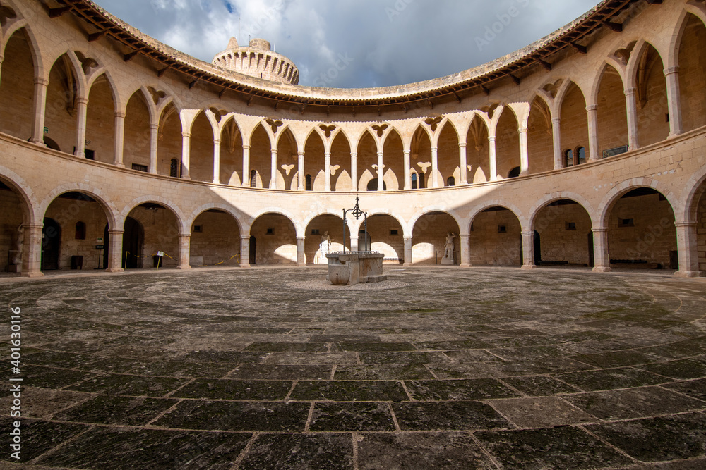 Inner courtyard of Bellver castle with its arcades in Palma de Majorca, Balearic Islands, Spain