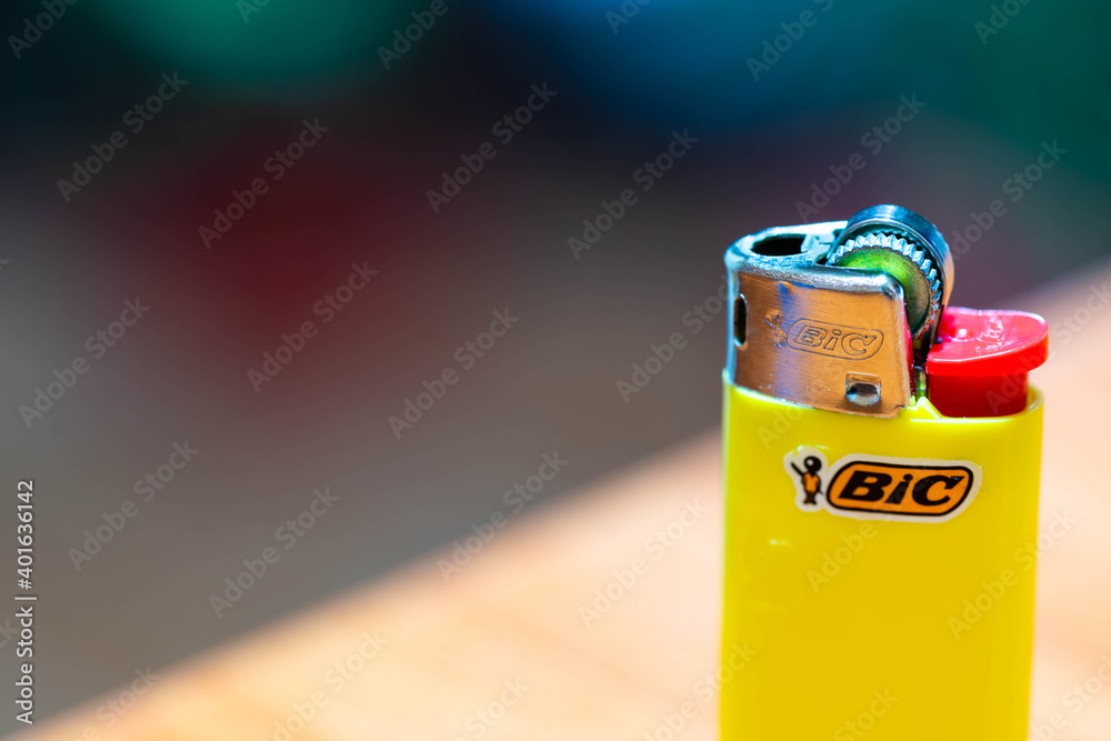 Miercurea Ciuc, 26 December 2020: yellow Bic cigarette lighter macro shot. Stock Photo | Adobe Stock