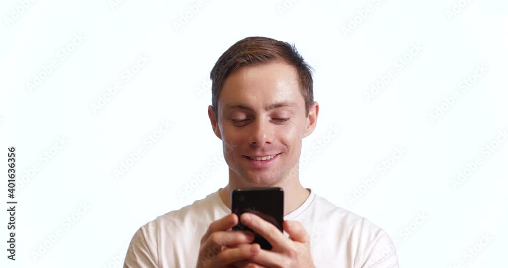 Smiling man using smart phone isolated on white background