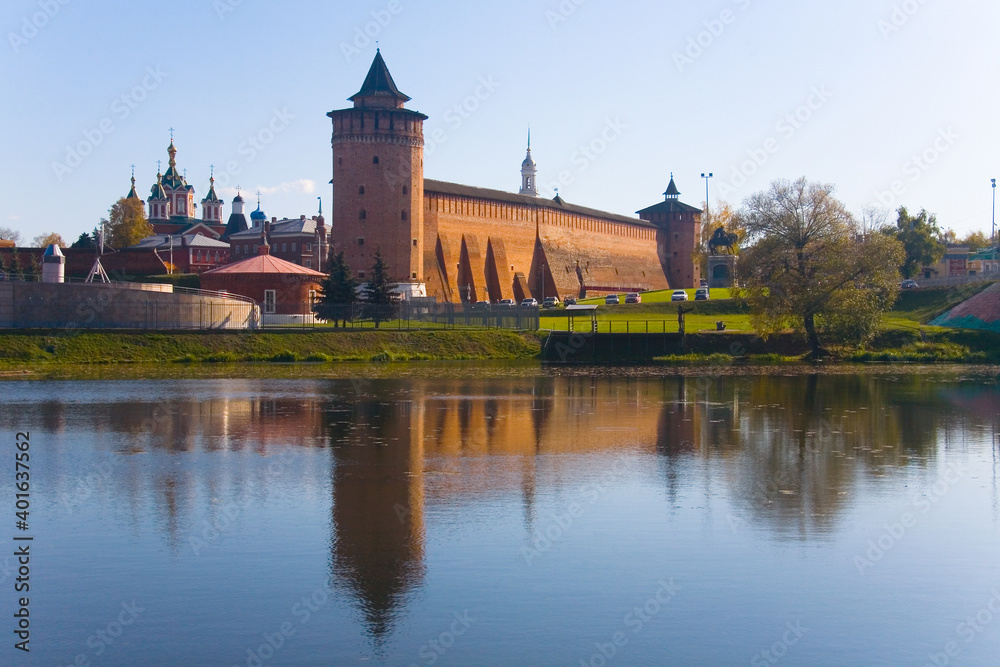 Marina tower of the Kolomna Kremlin is reflected in the water.