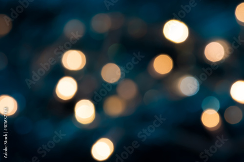 Bokeh blurry image on midnight blue background.