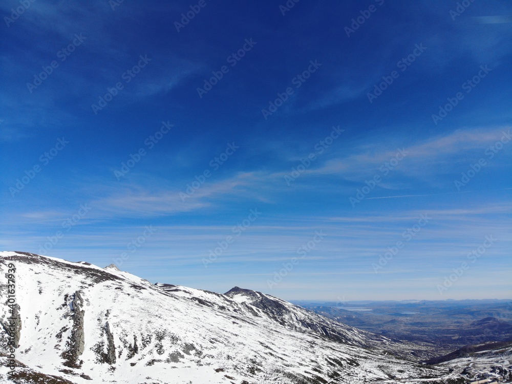 Aerial view of a snowy mountain in northern Spain