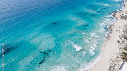 incredible beach with a turquoise sea in Formentera island seen from above