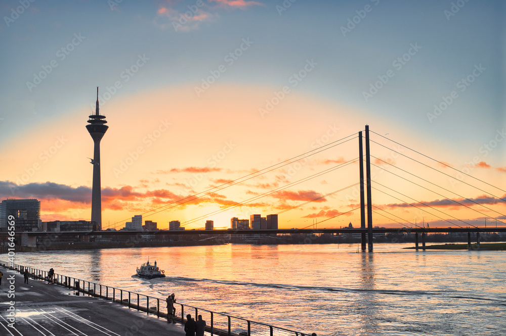 City of Düsseldorf. Its monuments, promenade and river Rhine. 