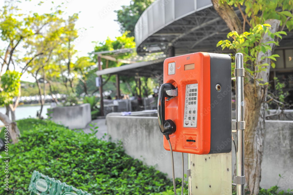 December 17, 2020 The vintage public phone booth of TOT Public Company Limited the decoration in the garden at King Rama 9 park in Bangkok Thailand