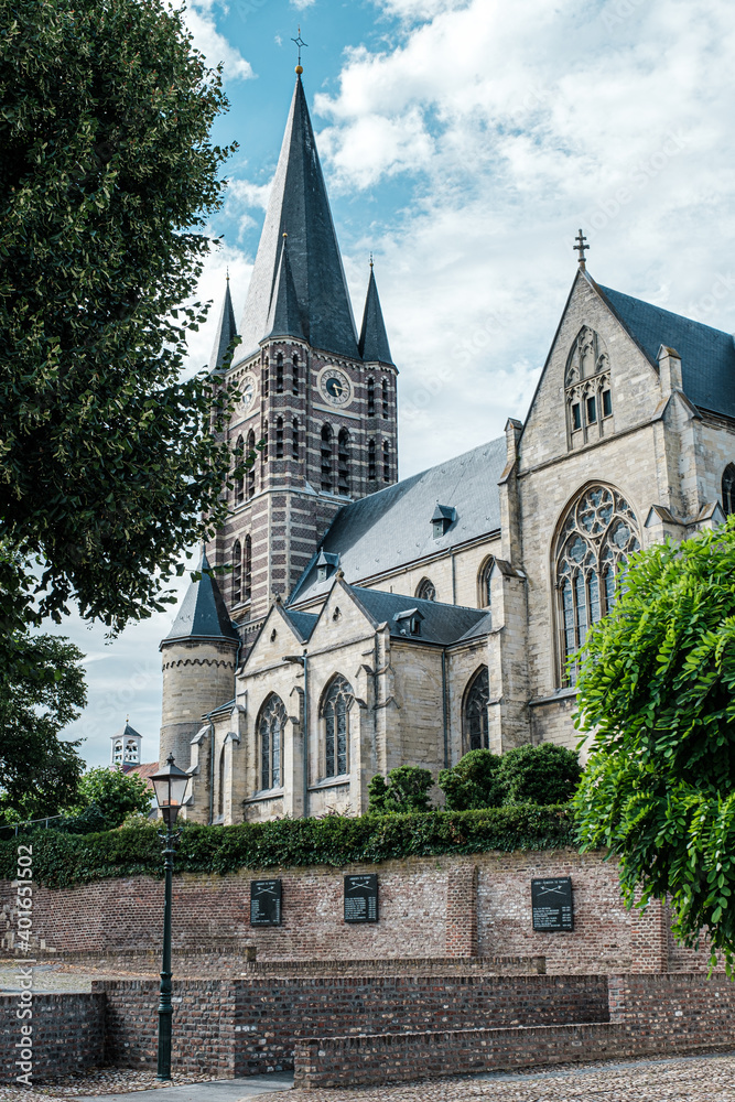The Saint Michaels church or Abbey Church of Thorn, Roman Catholic church from the 14th century. View of dutch white little town Thorn, province of Limburg, Netherlands The Saint Michaels church or Abbey Church of Thorn, Roman Catholic church from the 14th century. View of dutch white little town Thorn, province of Limburg, Netherlands