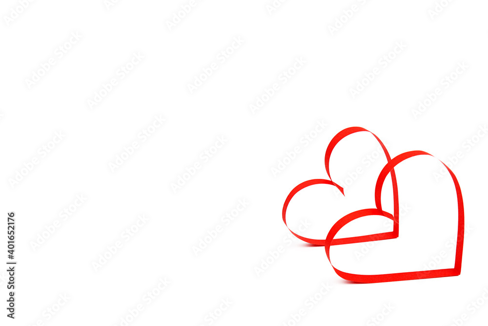 Paper cut hearts on a white background and copyspace. Valentine's Day, Mother's Day or Women's Day
