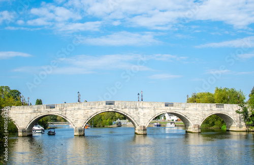 Chertsey Bridge over the River Thames in summer, Surrey, England photo