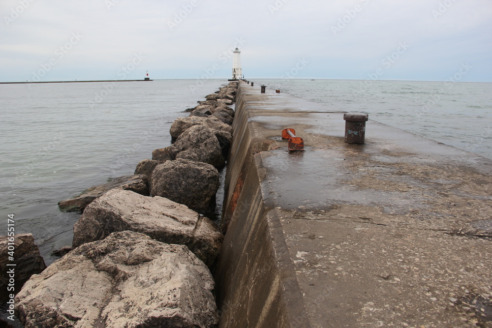 pier to a lighthouse