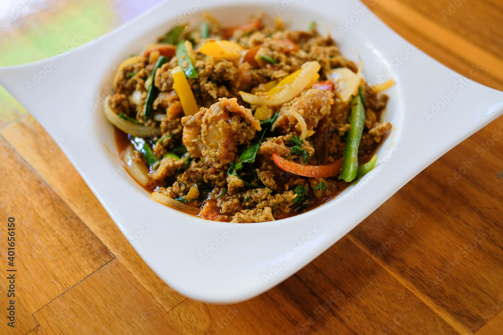 soft shell crab stir fried with curry powder paste, bell pepper, onion soft shell crab stir fried with curry powder paste, bell pepper, onion