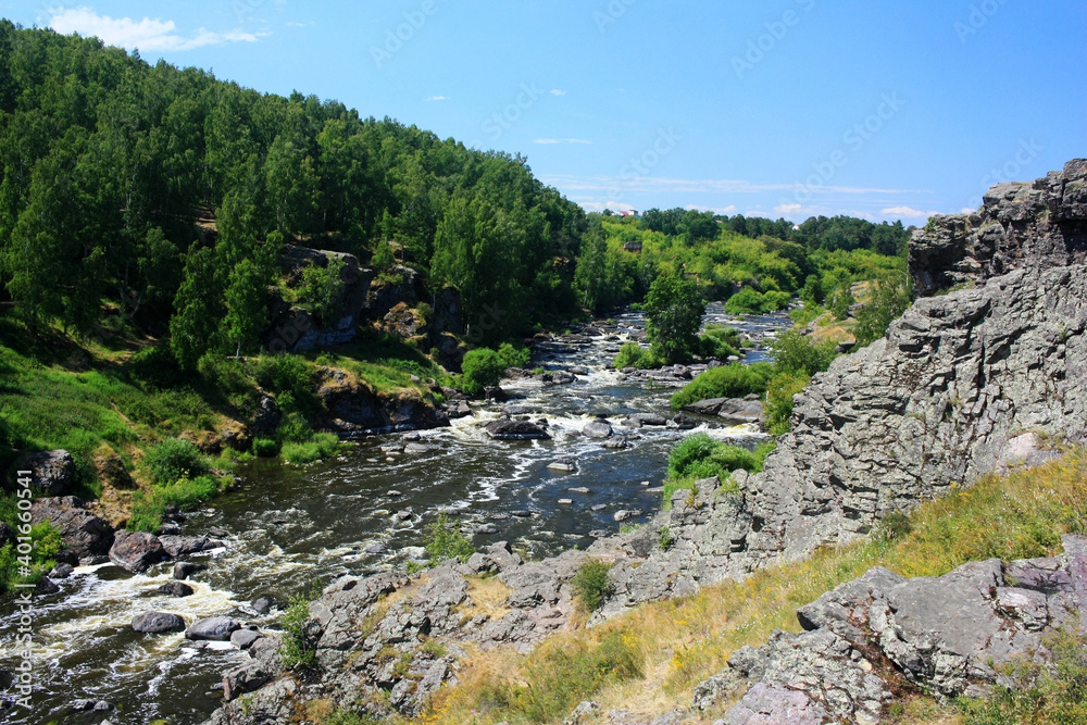 Mountain river flowing in stone gorge