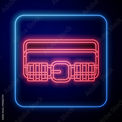 Glowing neon Hunting cartridge belt with cartridges icon isolated on blue background. Bandolier sign. Hunter equipment, armament. Vector.