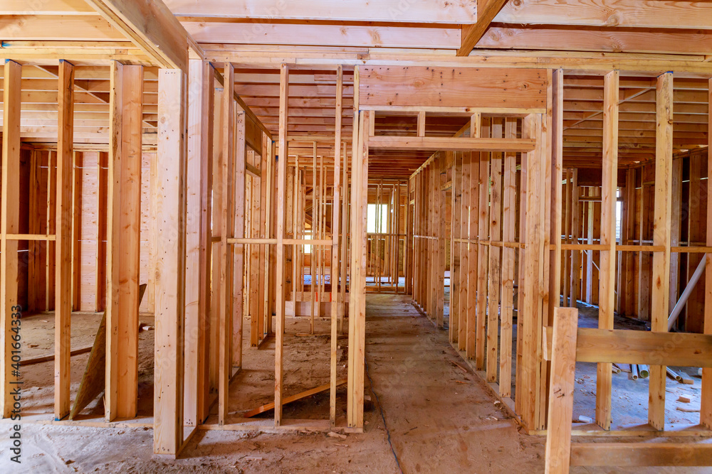 Wooden house in beams the view of interior frame structure on a new American development Wooden house in beams the view of interior frame structure on a new American development