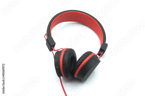 Closeup of black and red headphones on white background