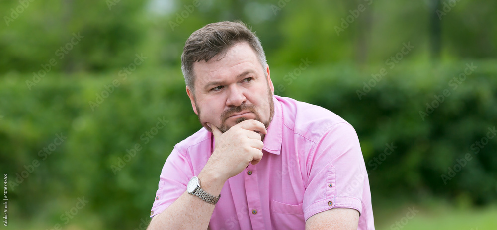 Adult solid man prone to overweight with a beard. Adult solid man prone to overweight with a beard.