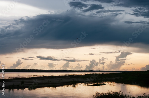 Fototapeta Naklejka Na Ścianę i Meble -  Amazon river, Amazon jungle, South America, clouds above the river, Peru, Ecuador