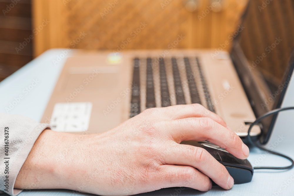 Hands using a laptop Hands using a laptop
