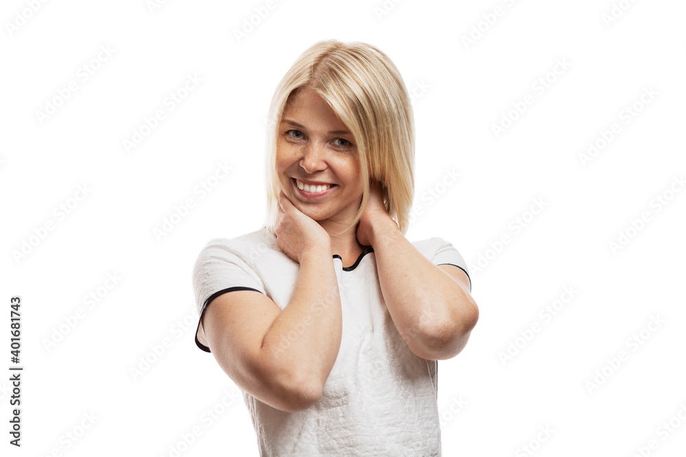 Smiling young blonde woman with freckles. Isolated on white background. Smiling young blonde woman with freckles. Isolated on white background.
