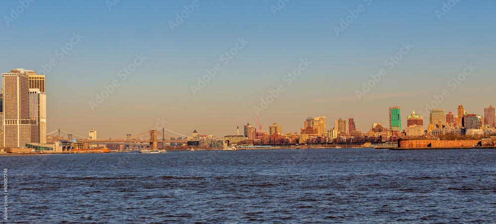 Skyscrapers in Brooklyn and Brooklyn bridge from the Hudson River, USA