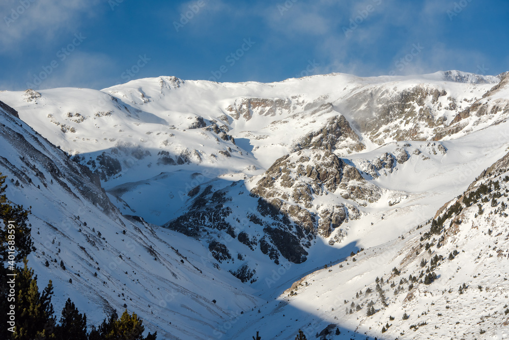 Mountains in the Pyrenees in Andorra in winter with lots of snow