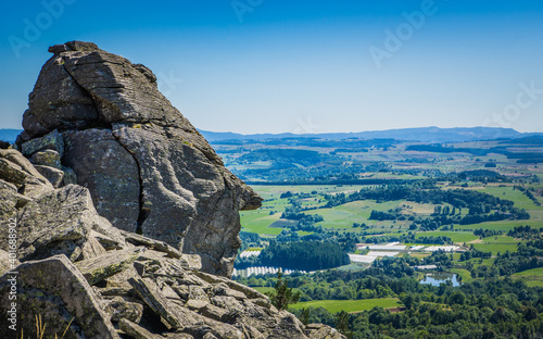 Hiking to the top of the Lizieux Peak (pic du Lizieux) with view of the rural landscape, and remains of former volcanoes photo