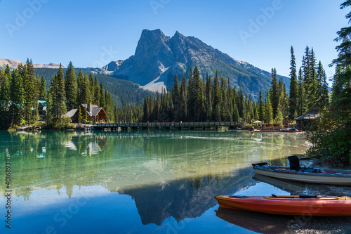 Canoeing on Emerald Lake in summer sunny day. Mount Burgess in the background. Yoho National Park  Canadian Rockies  British Columbia  Canada.
