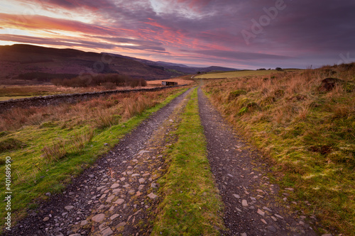 A farm road at dawn one the Gwrhyd mountain near Rhiwfawr and Cwmtwrch in South Wales UK 
