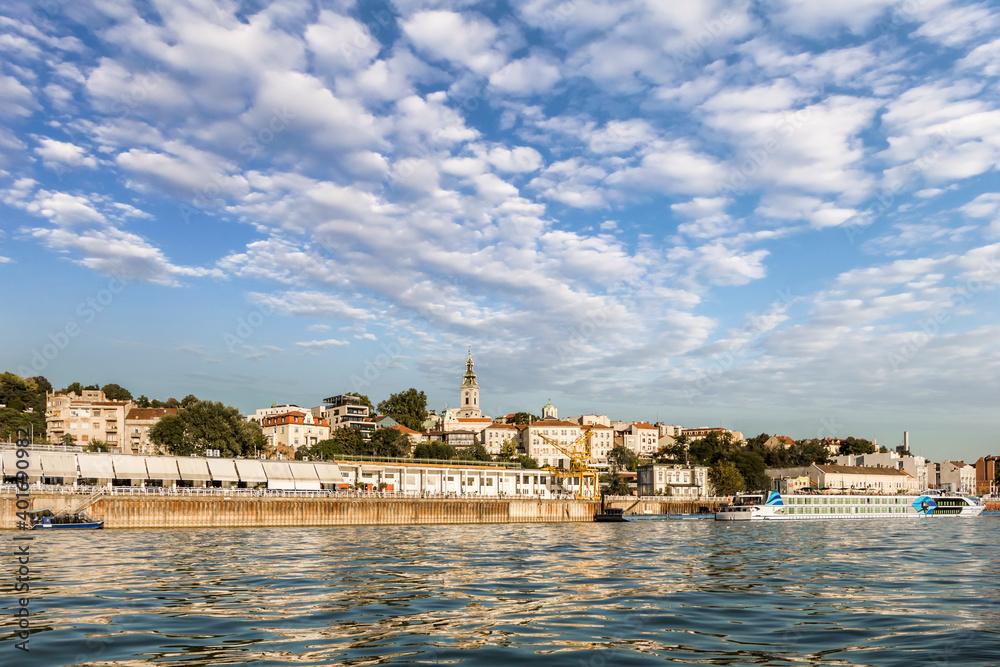 Panoramic image of Belgrade Tourist Nautical Port with Downtown skyline and blue cloudy skies, viewed from the  Sava river perspective.
