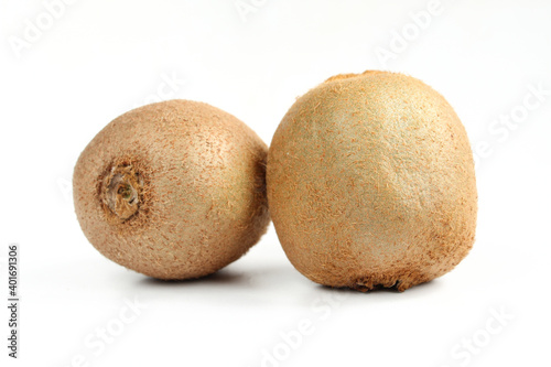 Two kiwi fruits isolated on white background. Healthy food close up