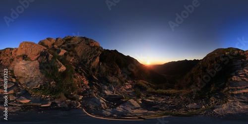 Spherical HDRI Panorama of sunrise in the mountains