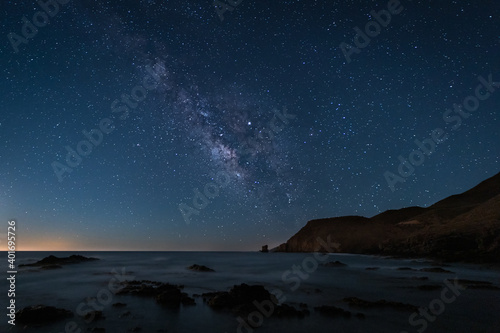 Night landscape with Milky Way on the coast of the Escullos. Natural Park of Cabo de Gata. Spain. © Eduardo Estellez