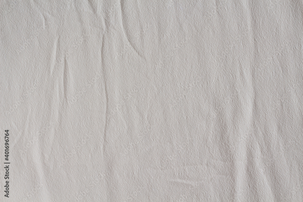 Fototapeta premium Light satin fabric texture. wrinkled