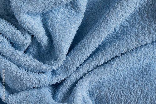 Draped blue terry towel. Texture