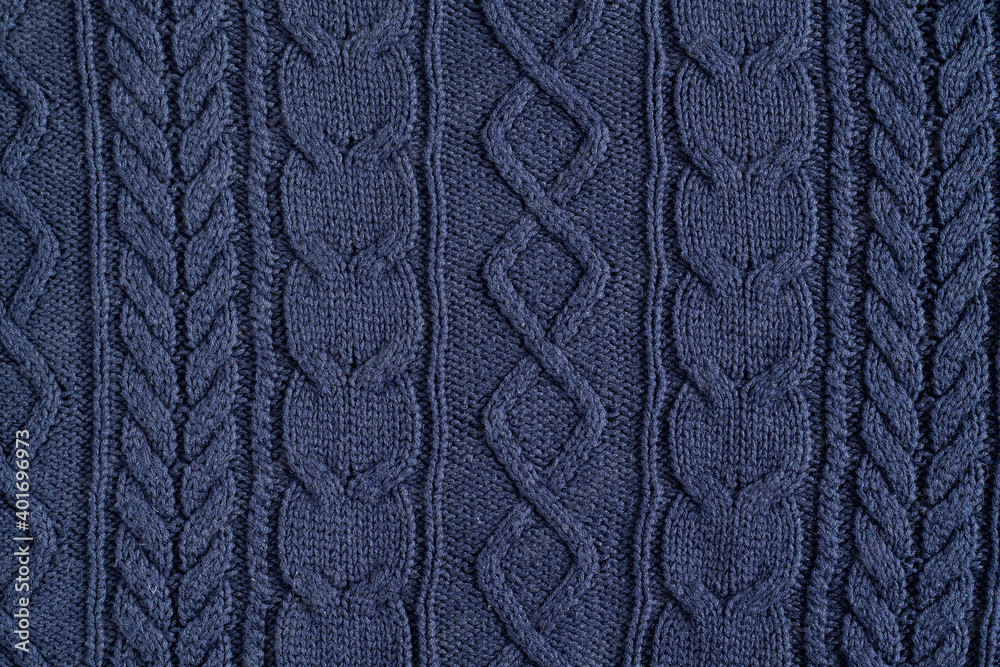 Knitted dark blue sweater texture