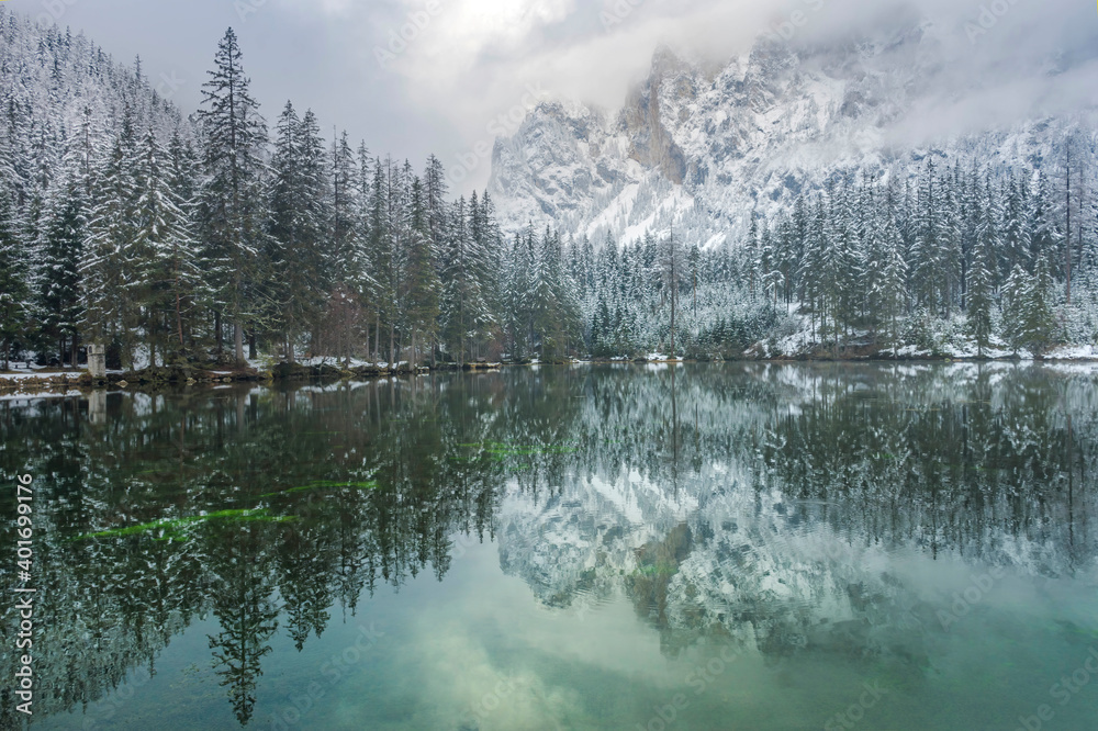 Amazing winter landscape with snowy mountains and clear waters of Green lake (Gruner see), famous tourist destination in Styria region, Austria Amazing winter landscape with snowy mountains and clear waters of Green lake (Gruner see), famous tourist destination in Styria region, Austria