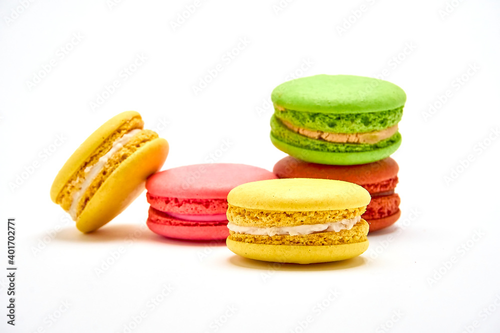 Delicious multicolored macaroons on white background. Delicious multicolored macaroons on white background.