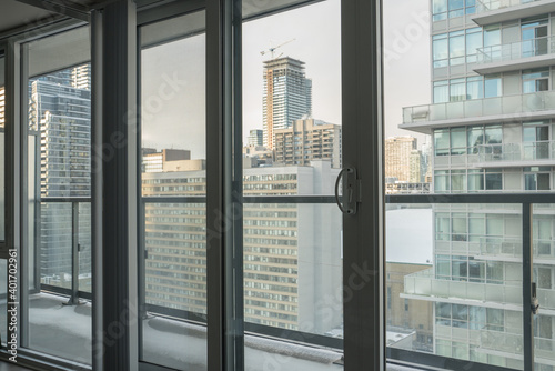 Photography Beautiful Metropolitan Cityscape View from a Glass Condominium during Sunset wit