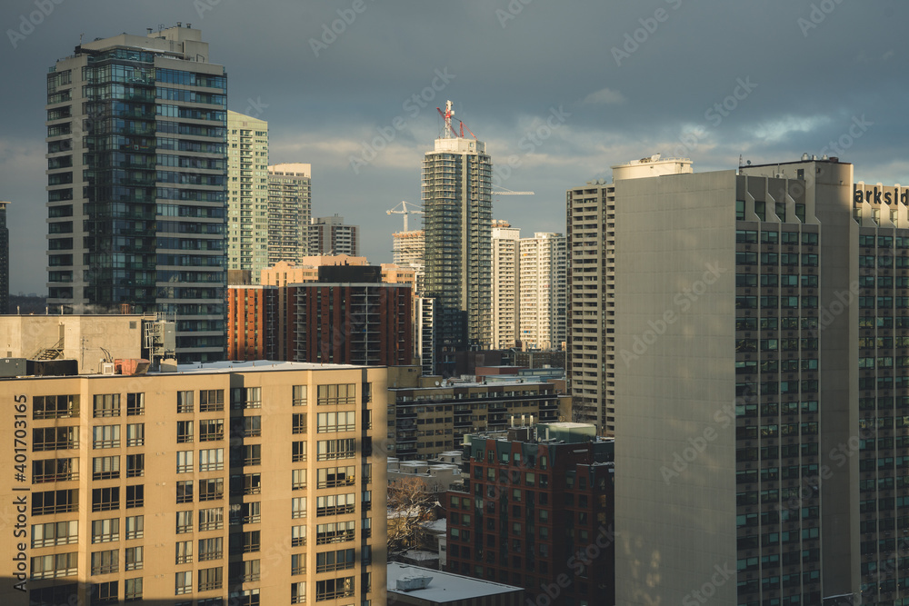 Urban cityscape view during sunset with dense buildings