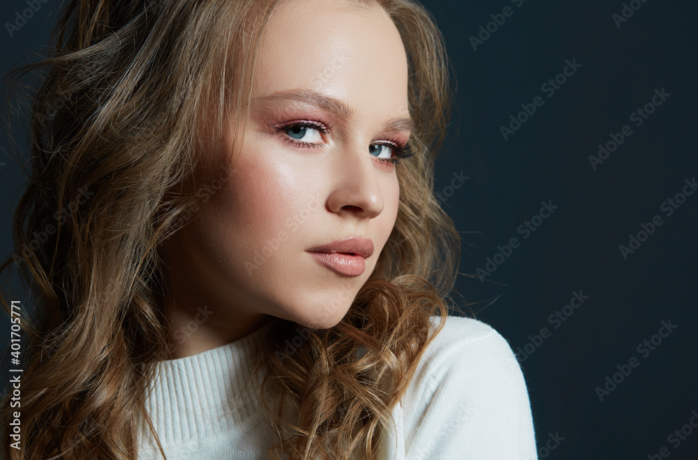 Portrait of beautiful woman model with fresh daily makeup and romantic wavy hairstyle Portrait of beautiful woman model with fresh daily makeup and romantic wavy hairstyle