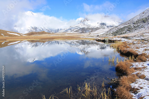 Amazing reflections in lake Plan du Lac Bellecombe looking towards La Grande Casse in the French alps
 photo